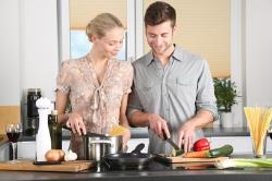 Albuquerque couple prepping dinner on their LG cooktop